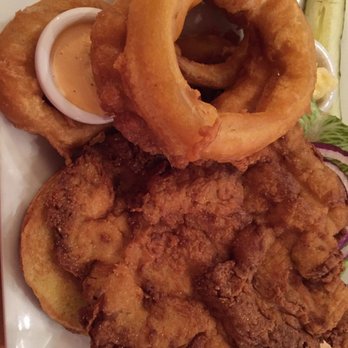 Fire By The Monon - Tenderloin and beer battered onion rings. - American Near Me - Indianapolis, Indiana