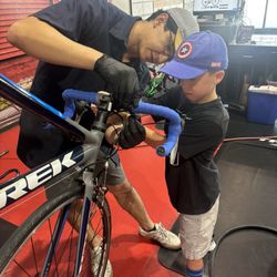 Trek Bicycle Katy - My son helping with the computer installation