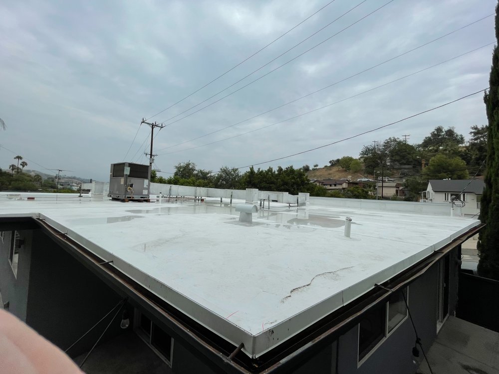 Slide of J & J Roofing