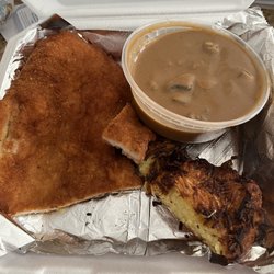 Kat-n-Around Authentic German Food - Schnitzel with potato pancake and mushroom gravy