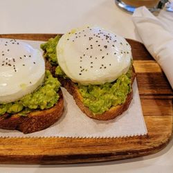 Caffe Gourmet - Avocado toast with eggs.
