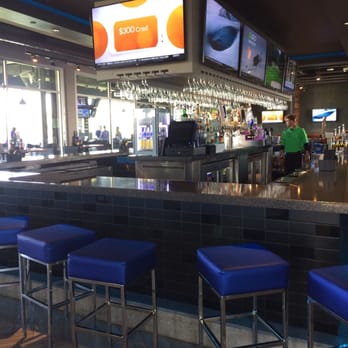 Topgolf - Bar on the main level - New American Near Me - Centennial, Colorado