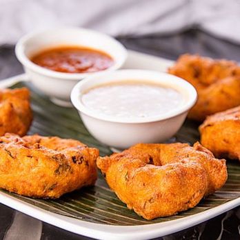 GumaGumalu - a plate of food with dipping sauce - Indian Near Me - Fremont, California GumaGumalu - a plate of food with dipping sauce - Indian Near Me - Fremont, California