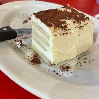 Buca di Beppo Italian Restaurant - This was the uneaten half a brick of "tiramisu" that ended up in the trash outside this Buca location. - Italian Near Me - Indianapolis, Indiana Buca di Beppo Italian Restaurant - This was the uneaten half a brick of "tiramisu" that ended up in the trash outside this Buca location. - Italian Near Me - Indianapolis, Indiana