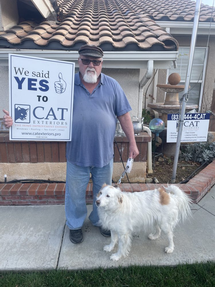 Slide of CAT Exteriors