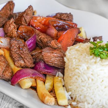 The Chicken Shack - Tender angus beef, sautéed onions and tomatoes, rice, French fries, lomo saltado - Peruvian Near Me - Lawndale, California The Chicken Shack - Tender angus beef, sautéed onions and tomatoes, rice, French fries, lomo saltado - Peruvian Near Me - Lawndale, California
