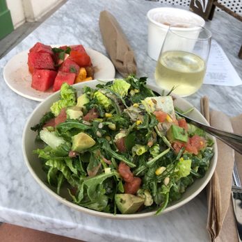 Flower Child - Artichoke salad and watermelon and heirloom tomatoes with a side of Pinot Grigio. What??? - Salad Near Me - Houston, Texas Flower Child - Artichoke salad and watermelon and heirloom tomatoes with a side of Pinot Grigio. What??? - Salad Near Me - Houston, Texas