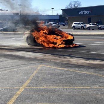 Mavis Discount Tire - Car catching fire just a few feet from there shop. - Tires Near Me - Glenolden, Pennsylvania Mavis Discount Tire - Car catching fire just a few feet from there shop. - Tires Near Me - Glenolden, Pennsylvania