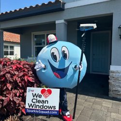 Sparkle Squad - Sparkle Squad Bubble man ready with water fed brush on extendable pole to clean windows.