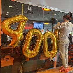 Orangetheory Fitness - Celebrating class number 4000 for one of our coaches at the OTF Evanston location.