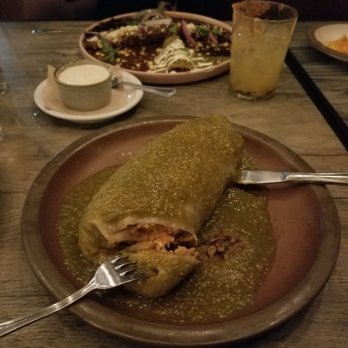 Madre - Wet Asada Burrito (not on menu) and Enchiladas in mole sauce. - Mexican Near Me - Torrance, California Madre - Wet Asada Burrito (not on menu) and Enchiladas in mole sauce. - Mexican Near Me - Torrance, California