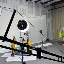7 House - Behind the scenes of a product photography shoot--showcasing our client's latest equipment with precision lighting and motion rigging.