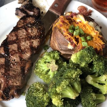 Bozos Too - New York strip, broccoli and loaded baked potato - Seafood Near Me - Pascagoula, Mississippi Bozos Too - New York strip, broccoli and loaded baked potato - Seafood Near Me - Pascagoula, Mississippi