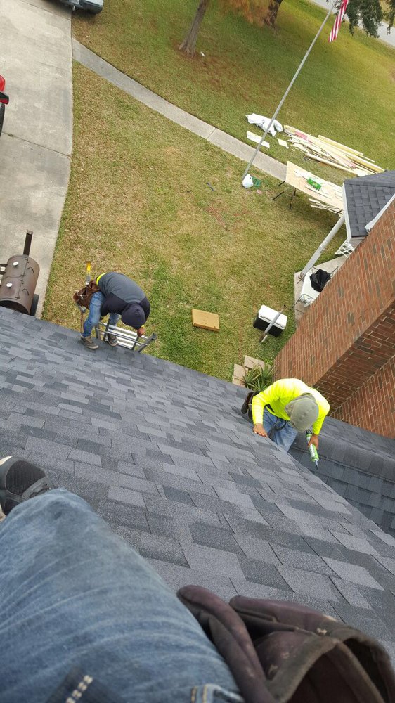 Slide of Champ Vision Roofing Services