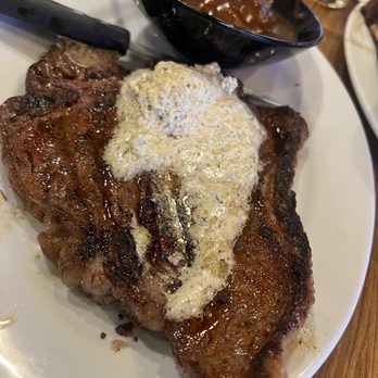 Mickey's Top Sirloin - Tbone with garlic butter - Steakhouses Near Me - Denver, Colorado Mickey's Top Sirloin - Tbone with garlic butter - Steakhouses Near Me - Denver, Colorado