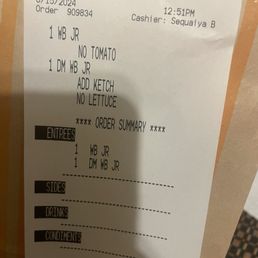 The ticket that proved the person took the order wrong didn't add cheese put no tomato and they still added tomato to the burger The ticket that proved the person took the order wrong didn't add cheese put no tomato and they still added tomato to the burger
