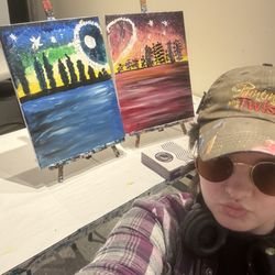 Painting with a Twist - This is the outcome of me and my husband's picture and yes our instructor E .  If you want a fun class book with E ...