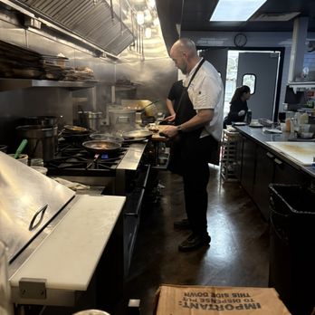 Cool Springs Fish Bar & Restaurant - View of cooks from our bar seats. - Seafood Near Me - Dover, Delaware Cool Springs Fish Bar & Restaurant - View of cooks from our bar seats. - Seafood Near Me - Dover, Delaware