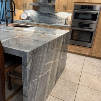 Granite & Marble Concepts - Edge detail of waterfall with mitered edges and waterfall return. - Flooring Near Me - El Cajon, California Granite & Marble Concepts - Edge detail of waterfall with mitered edges and waterfall return. - Flooring Near Me - El Cajon, California