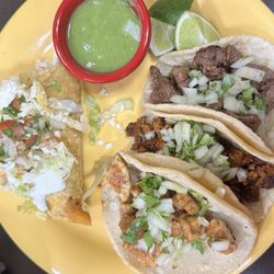 Chicken taco, chorizo empanadas, asada taco, and chorizo taco. Salsa verde goes great with it.