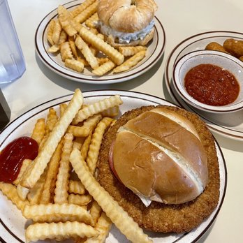 Cow Palace - Tenderloin Sandwich, Chicken Salad Croissant, Fries and Mozzarella Sticks. - American Near Me - Shelbyville, Indiana Cow Palace - Tenderloin Sandwich, Chicken Salad Croissant, Fries and Mozzarella Sticks. - American Near Me - Shelbyville, Indiana