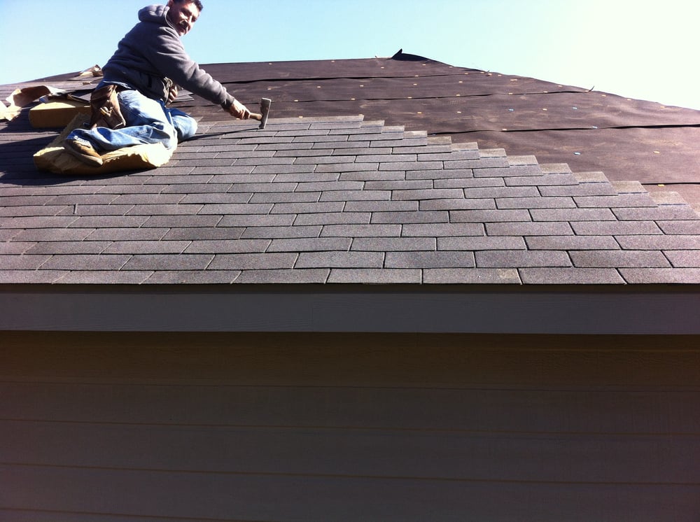 Slide of S&B Tip-Top Roofing