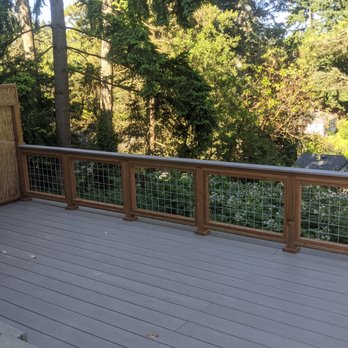 BT Contracting LLC - Decks with details: wide-plank composite with wire fencing and bamboo - General Contractors Near Me - Lake Forest Park, Washington BT Contracting LLC - Decks with details: wide-plank composite with wire fencing and bamboo - General Contractors Near Me - Lake Forest Park, Washington