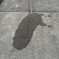 Walmart Auto Care Centers - Oil leak in my driveway after a visit to Walmart "Auto Care" Center.