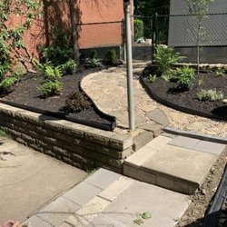Stef’s Yard Work and Landscaping - Installed pavers with flagstone and gravel walkway along with boarder, plants, and mulch.
