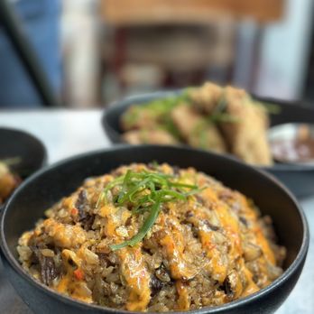 Rush Hour Bar - a bowl of rice with meat and vegetables - Bars Near Me - Toronto, Ontario Rush Hour Bar - a bowl of rice with meat and vegetables - Bars Near Me - Toronto, Ontario