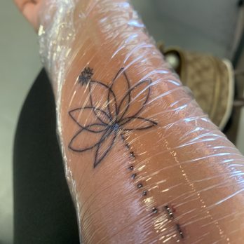 Ink and Dreams Nanakuli - Lotus flower, Little Sun - Tattoo Near Me - Waianae, Hawaii Ink and Dreams Nanakuli - Lotus flower, Little Sun - Tattoo Near Me - Waianae, Hawaii