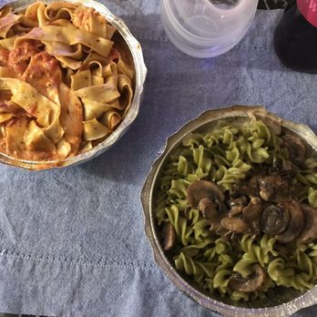 Bombolini Pasta - Chicken Rose Meal with herb seasoning and parppadelle noodles on the left and Alfredo Sauce and mushrooms with spinach and fusilli noodles. - Italian Near Me - Richmond, Virginia