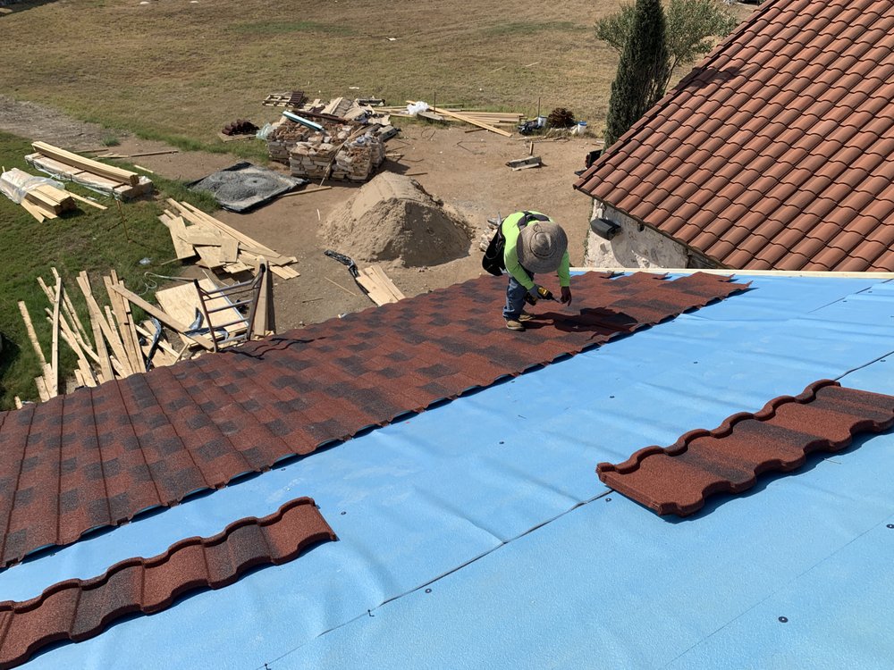 Slide of Top Notch Roofing