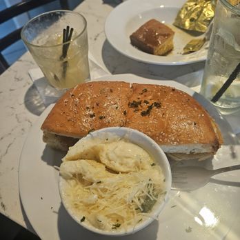 Huey's On the River - Fried Green Tomato Muffuletta and those Parmesan & Garlic Grits! - Cajun/Creole Near Me - Savannah, Georgia Huey's On the River - Fried Green Tomato Muffuletta and those Parmesan & Garlic Grits! - Cajun/Creole Near Me - Savannah, Georgia