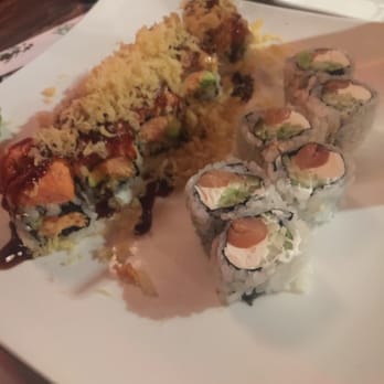 Wasabi - Spicy family roll on the left, classic Philadelphia roll on the right. Would recommend both highly. Love mixing classic and new... - Japanese Near Me - Buffalo, New York