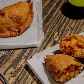 Empanada Mama - Hell's Kitchen - Viagra empanada Tiger shrimp, scallops, crab stick, and chiles stuffed into a wheat empanada. AMAZING! - Latin American Near Me - New York, New York
