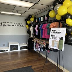 Pacific Coast Gymnastics - Our new proshop is looking good in our lobby!