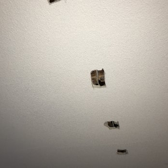 Think Painting - "BEFORE" - the holes in my living room ceiling from the chandelier installation - Painters Near Me