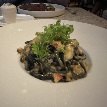 Queensyard - Squid ink linguine with lobster and clams - Modern European Near Me - New York, New York Queensyard - Squid ink linguine with lobster and clams - Modern European Near Me - New York, New York