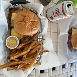 Oli And Eli’s Grill - Cheese burger and hand cut fries with seasoning on side. (Next time seasoning will not be on side, it was delicious!)