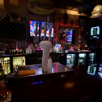 Rosie's Tavern - a bar with a beer on the counter - Bars Near Me - Dunedin, Florida Rosie's Tavern - a bar with a beer on the counter - Bars Near Me - Dunedin, Florida