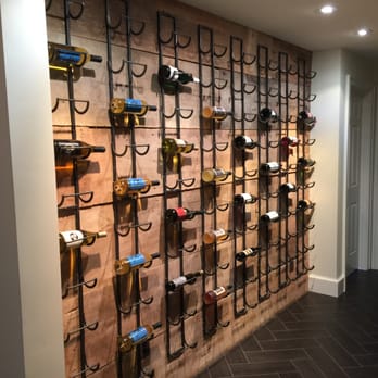 Miller Home Improvements - a wall of wine racks - General Contractors Near Me - Catlett, Virginia