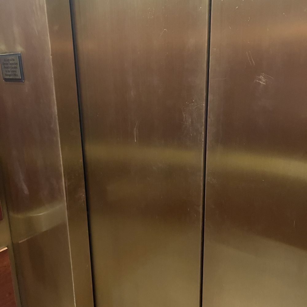 Houston Marriott Energy Corridor - Worn and tarnished elevator doors - Hotels Near Me - Houston, Texas Houston Marriott Energy Corridor - Worn and tarnished elevator doors - Hotels Near Me - Houston, Texas