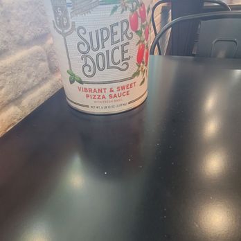 Frico - Large tomato cans hold napkins at the tables - Pizza Near Me - Sacramento, California Frico - Large tomato cans hold napkins at the tables - Pizza Near Me - Sacramento, California