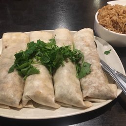 So I ordered Mushu Pork and was not expecting this. It says served with crepes but these are flour tortillas. Chinese tacos anyone? So I ordered Mushu Pork and was not expecting this. It says served with crepes but these are flour tortillas. Chinese tacos anyone?