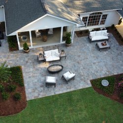 Landscapes by Wyatt Farms - Backyard retreat with a patio, fire pit, landscape lighting and