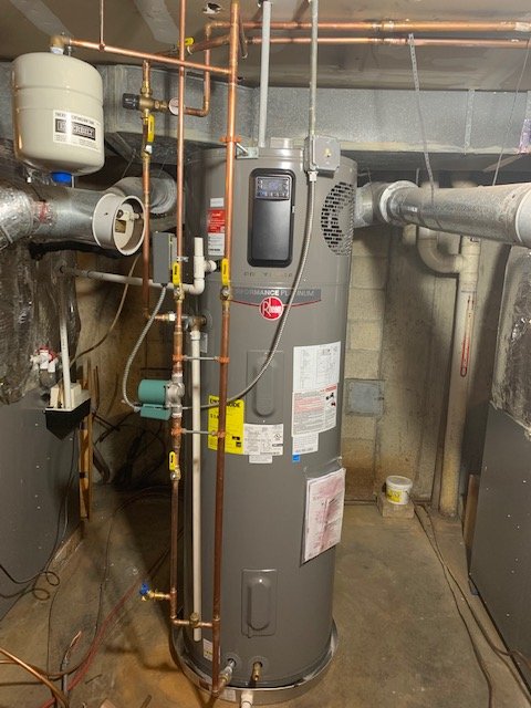 Slide of Louis Hollister Plumbing-Heating-Pumps