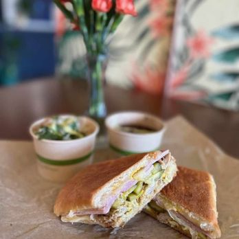 Cafe Mi Amor - a sandwich cut in half with a side of salad - Cafes Near Me - Hot Springs, Arkansas