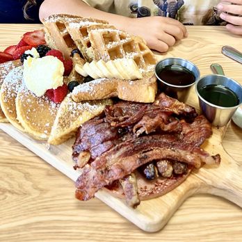 The Breeze Cafe - Breeze Breakfast Board: Pancakes, Waffles, French Toast, strawberries, blueberries, raspberries, bananas, bacon, ham, sausage, butter, syrup - Breakfast & Brunch Near Me - Newark, California The Breeze Cafe - Breeze Breakfast Board: Pancakes, Waffles, French Toast, strawberries, blueberries, raspberries, bananas, bacon, ham, sausage, butter, syrup - Breakfast & Brunch Near Me - Newark, California