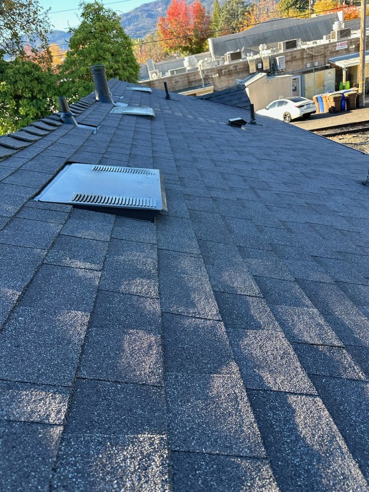 Slide of Zaguilan Roofing Service